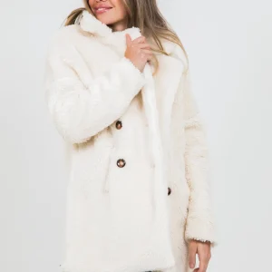 Manteau fausse fourrure crème